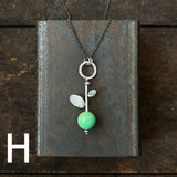 Lunar Sprout Pendant with Gemstone Bead