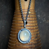 Golden Moonstone Orbit Pendant with Gilded Star
