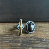Split Ring with Gilded Star and Black Moonstone