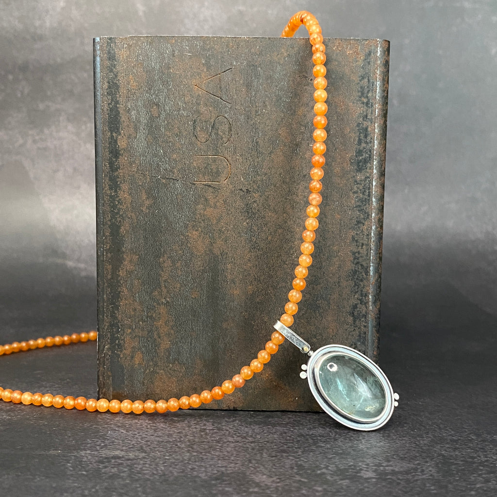 Orbit Pendant with Aquamarine and Orange Jade