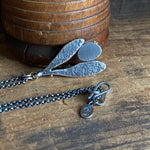 Lunar Sprout Pendant with Garnet