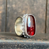 Hessonite Garnet Ring with Wide Band and Dotted Frame