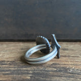 Split Ring with Gilded Star and Black Moonstone