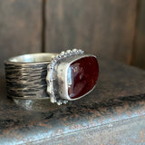 Hessonite Garnet Ring with Wide Band and Dotted Frame