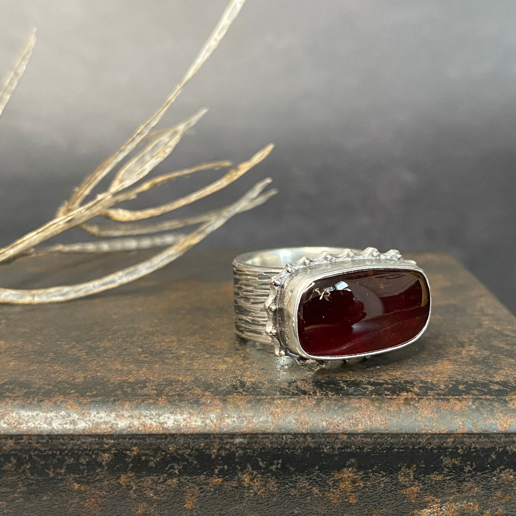 Hessonite Garnet Ring with Wide Band and Dotted Frame